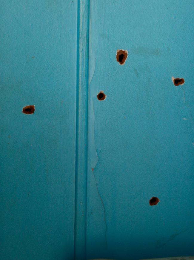 The pellet holes at the crime scene at Jolly St