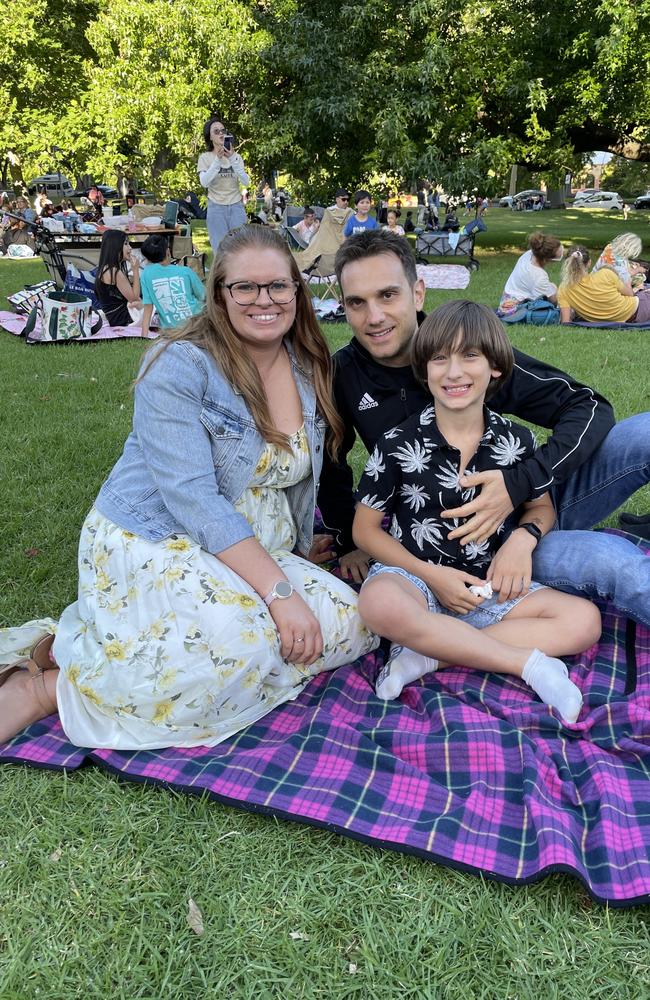 Megan, Silvio and Nicolas Creed at Treasury Gardens in the Melbourne CBD for the 2024 New Year's Eve fireworks. Picture: Gemma Scerri