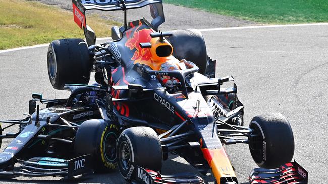 Max Verstappen’s Red Bull lands on top of Lewis Hamilton’s Mercedes during the Italian Grand Prix at Monza. Picture: Getty Images)