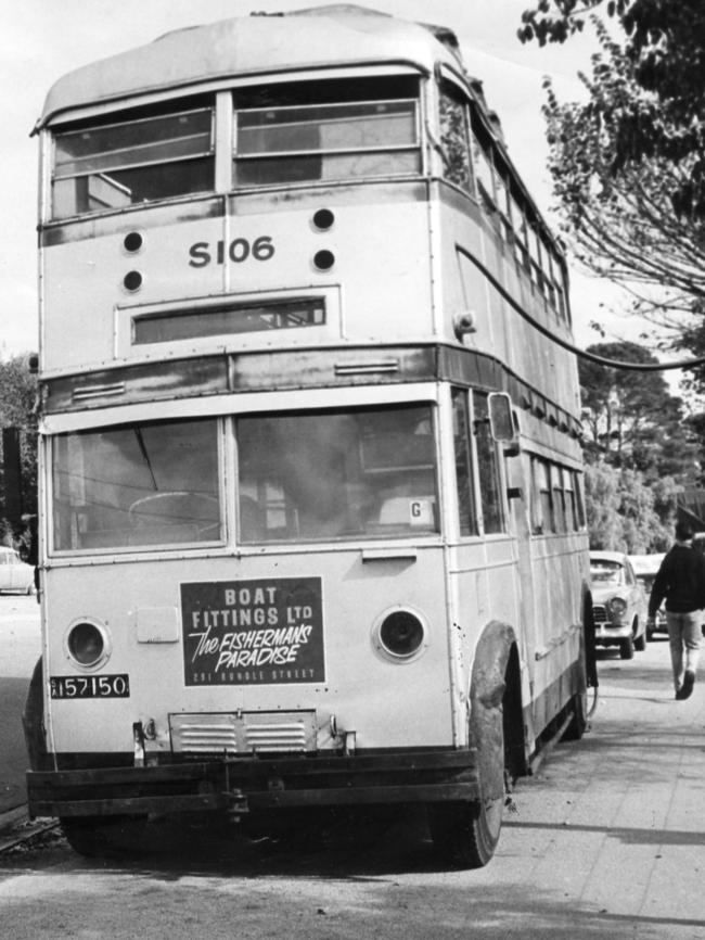 This is a bus parked on Rundle St in Kent Town in 1965 that was used as a rest spot for bus drivers. It had a tables and seats for drivers’ breaks.