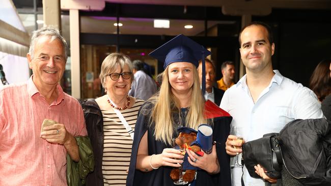 Graduate Brandi Olliff with dad Dad Nick and mum Marilyn and husband Alex at the Deakin University Graduation post ceremony celebration. Picture: Alison Wynd