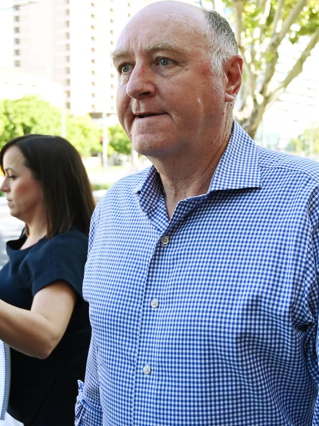 Former Renewal SA chief executive John Hanlon outside Adelaide Magistrates Court on Wednesday after his first court appearance. Picture: AAP / David Mariuz