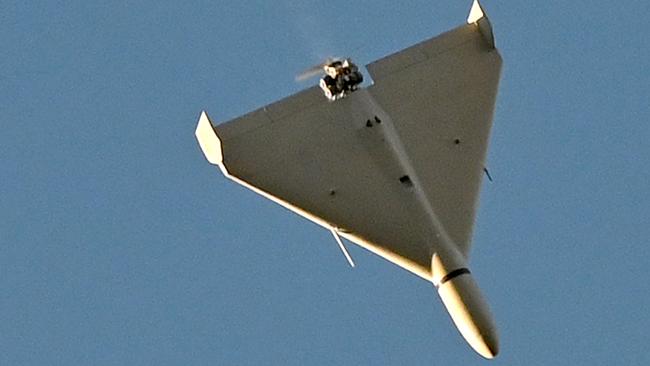 A Russian drone flies over Kyiv during an attack on infrastructure. Picture: AFP.