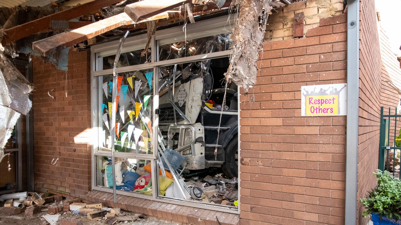 Truck ploughs though an intersection hitting multiple cars and crashing into a classroom at St Josephs Catholic Primary School Moorebank. Picture: Thomas Lisson