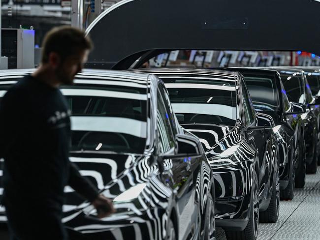(FILES) A line of electric vehicles of the model Y is pictured during the start of the production at Tesla's 