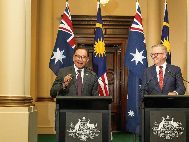 This handout taken and released on March 4, 2024 by the ASEAN-Australia Special Summit 2024 shows Australia's Prime Minister Anthony Albanese (R) and Malaysia's Prime Minister Anwar Ibrahim attending a joint press conference at the Government House in Melbourne. (Photo by Steve CHRISTO / ASEAN-Australia Special Summit 2024 / AFP) / XGTY / RESTRICTED TO EDITORIAL USE - MANDATORY CREDIT "AFP PHOTO / ASEAN-Australia Special Summit 2024 / STEVE CHRISTO" - NO MARKETING - NO ADVERTISING CAMPAIGNS - DISTRIBUTED AS A SERVICE TO CLIENTS