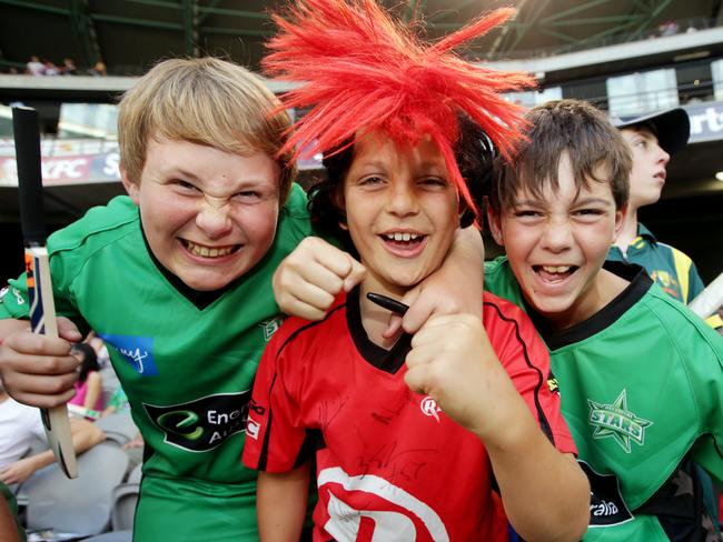 Young Melbourne Stars and Melbourne Renegades fans share the excitement of a KFC Big Bash League derby.