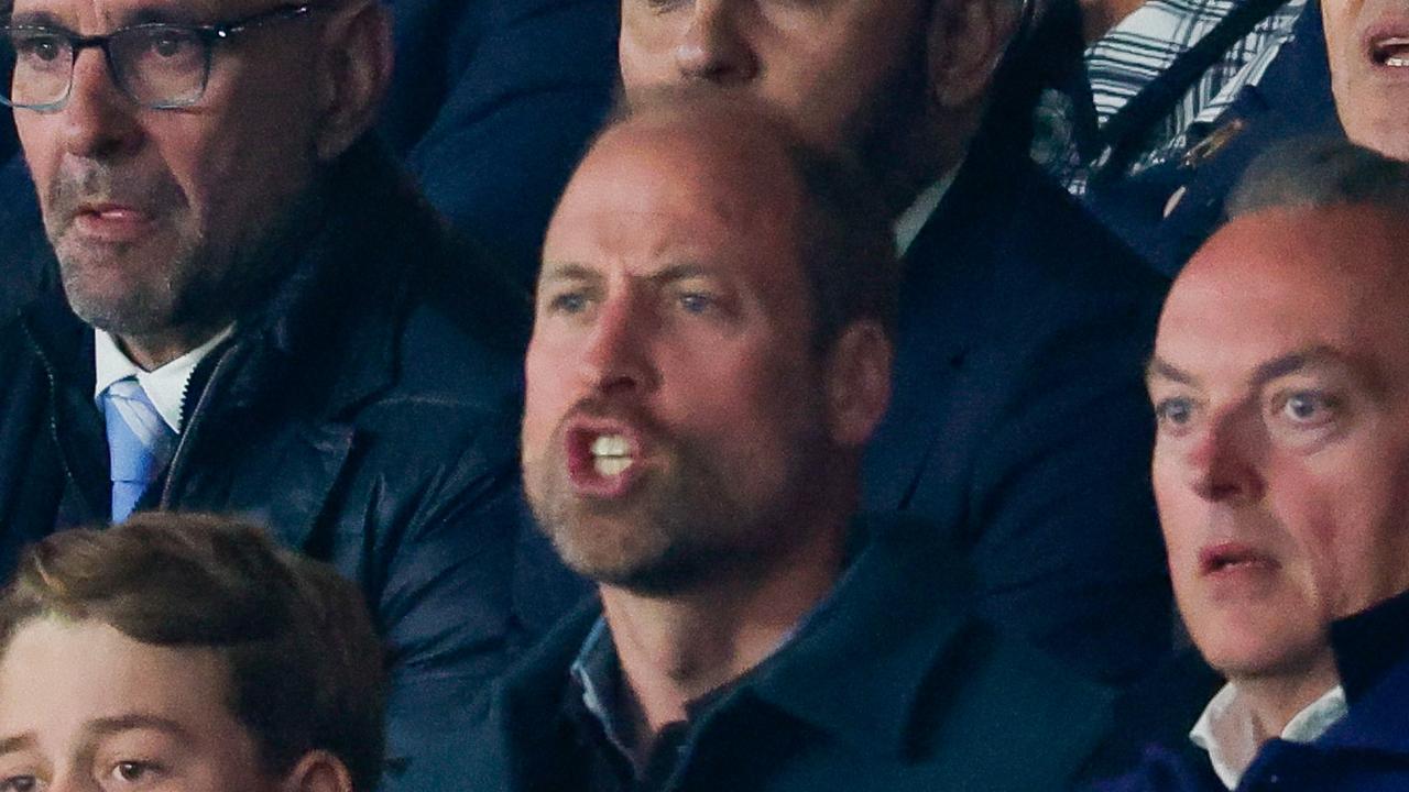 Prince William, Prince of Wales and Prince George of Wales are seen during the UEFA Champions League 2024/25 Quarterfinal.