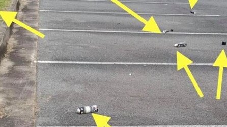 Aerosol cans used for drug abuse fond discarded in a railway station carpark.