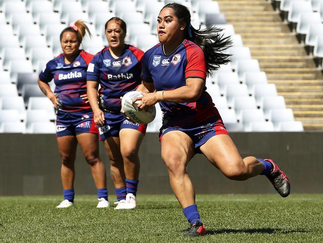 Gwen Swann with the ball for Collegians. Picture: John Appleyard