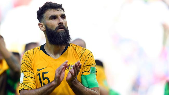 Australia's midfielder Mile Jedinak applaud their fans after being defeated by France at the end of the Russia 2018 World Cup Group C football match between France and Australia at the Kazan Arena in Kazan on June 16, 2018. / AFP PHOTO / SAEED KHAN / RESTRICTED TO EDITORIAL USE - NO MOBILE PUSH ALERTS/DOWNLOADS