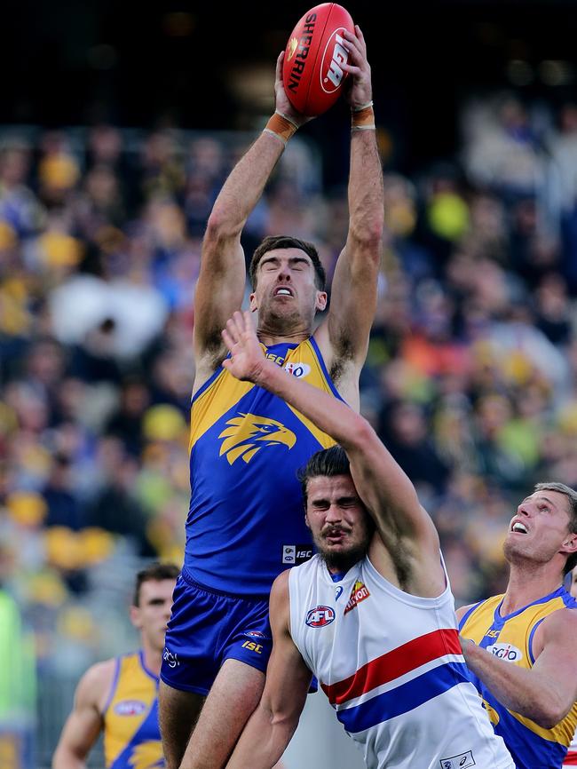 PERTH, WESTERN AUSTRALIA — JULY 22: Scott Lycett of the Eagles takes an overhead mark during the round 18 AFL match between the West Coast Eagles and the Western Bulldogs at Optus Stadium on July 22, 2018 in Perth, Australia. (Photo by Will Russell/AFL Media/Getty Images)