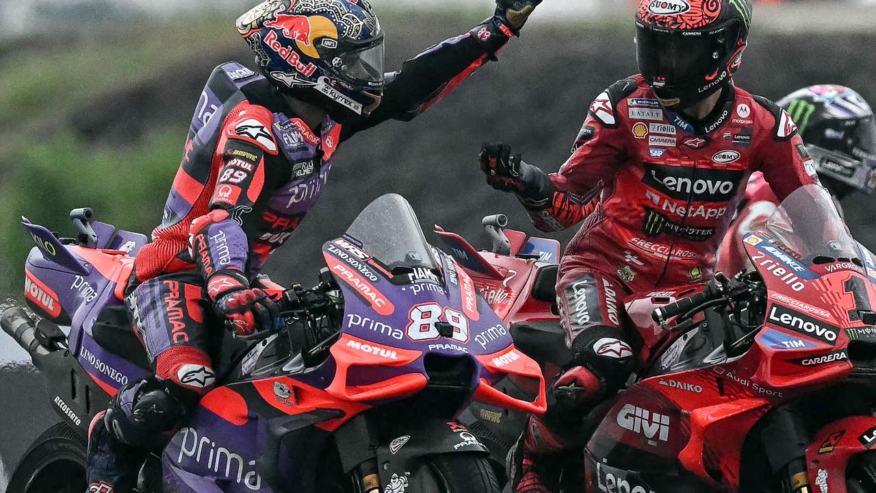 Race winner Ducati Lenovo Team's Italian rider Francesco Bagnaia (R) is greeted by second place Prima Pramac Racing's Spanish rider Jorge Martin (L) after the MotoGP Thailand Grand Prix at the Buriram International Circuit in Buriram on October 27, 2024. (Photo by Lillian SUWANRUMPHA / AFP)