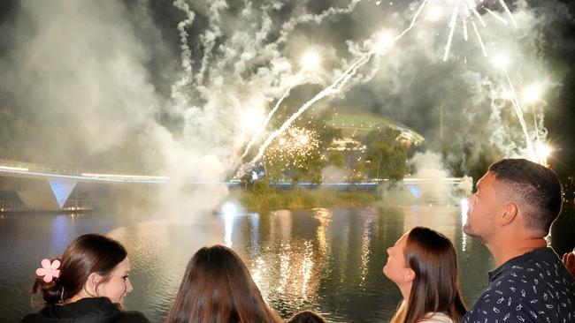 People gathering in Elder Park, ready for the fireworks. Craig and Danielle Pope and their kids, Katie,18, Ellie,15, and Rory,8, live at Munno Para, after having moved from Somerset in the UK 18 months ago. It was their first New YearÃs fireworks display at Elder Park. 31 December 2024. Picture Dean Martin