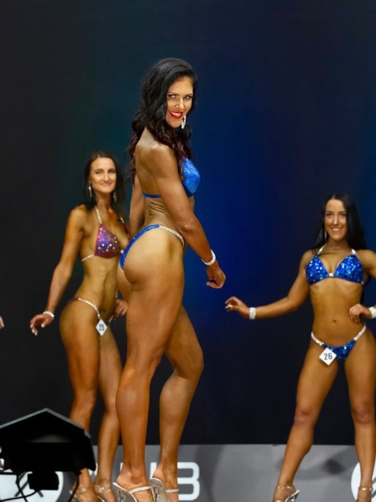 Paula Mandl took home 1st place in the Bikini Model 45+ age category and overall Bikini Competitor across all age groups sporting a custom-made Wonder Woman bikini at the Australian Natural Bodybuilding Queensland State Titles 2020. Picture: Gary Harvey.