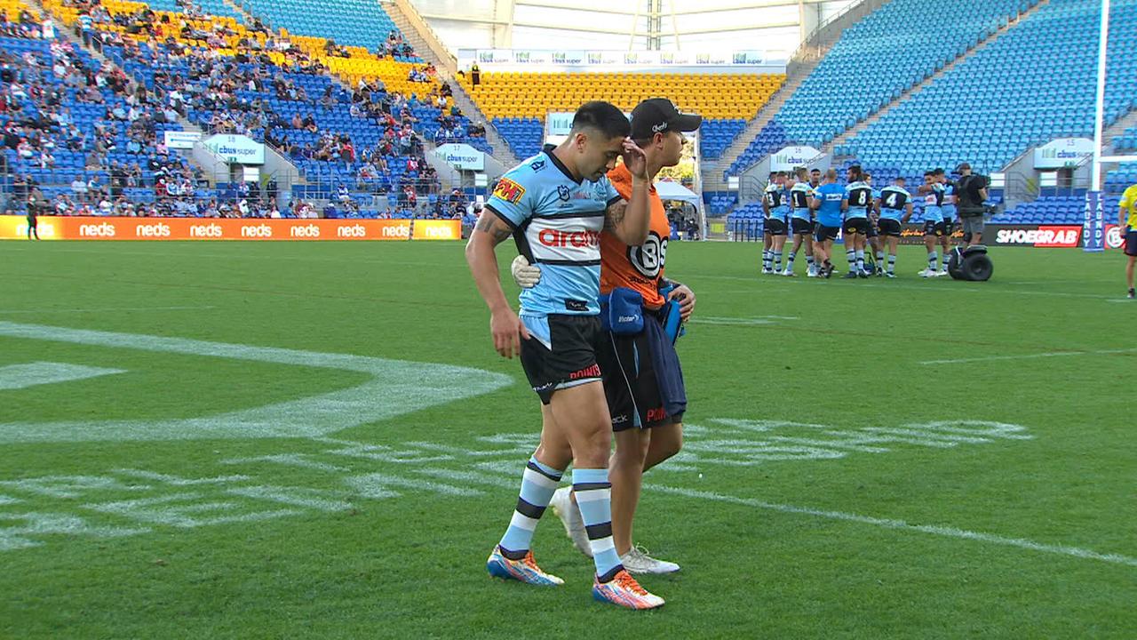 Shaun Johnson leaves the field with a hamstring injury.