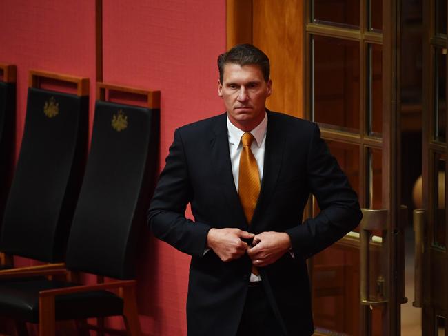 Australian Senator Cory Bernardi leaves after announcing his defection from the Liberal Party at Parliament House. Picture: AAP Image/Mick Tsikas