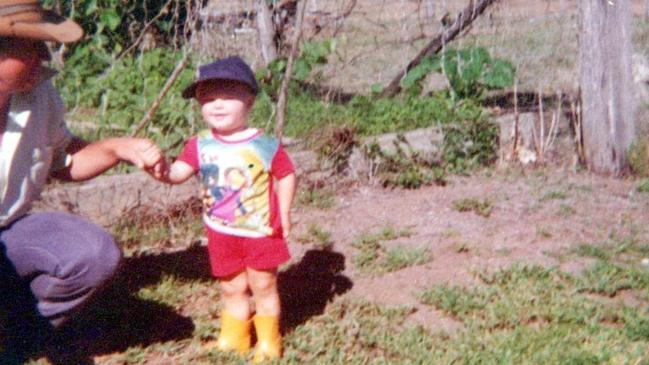 Natalie Hatton as a child in the garden of Dareen Station with her father Paul Hatton.