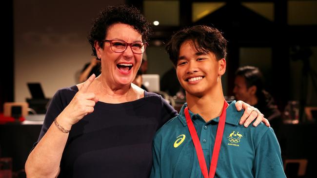 Rhondda Dunne celebrates as she poses with her son after his victory in the 2023 WDSF Oceania Breaking Championships (Photo by Mark Kolbe/Getty Images)