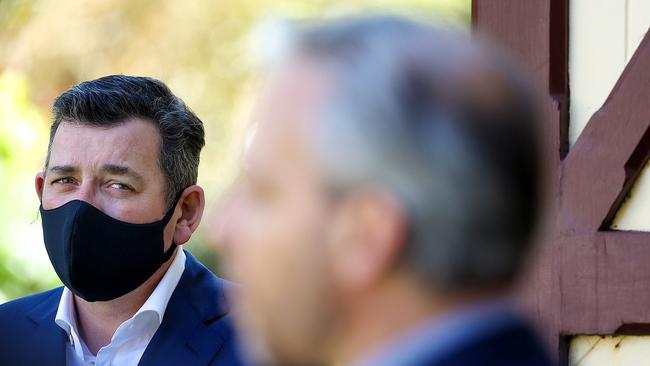 Victorian Premier Daniel Andrews looks on as Chief Health Officer Brett Sutton discusses the latest case numbers. Picture : NCA NewsWire / Ian Currie