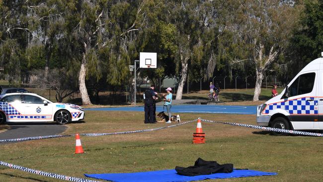 Police at Frascott Park in Varsity Lakes where they have established a crime scene. Picture: AAP