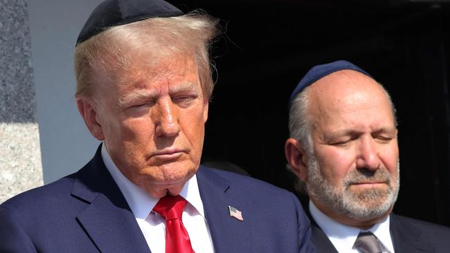 Donald Trump commemorated the one-year anniversary of the October 7 attack on Israel by visiting Ohel Chabad Lubavitch in New York, with the family of Edan Alexander, who was taken hostage by Hamas. Picture: Getty Images