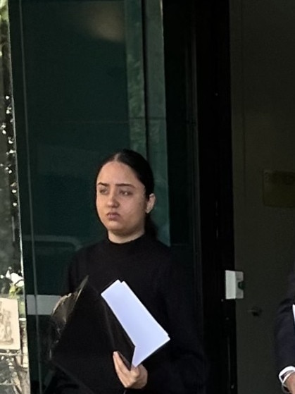 Ashpreet Kaur leaving Geelong Magistrates Court with her lawyer.