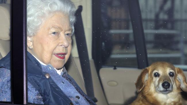 The Queen with her beloved pooch, Candy. Picture: PA via AP