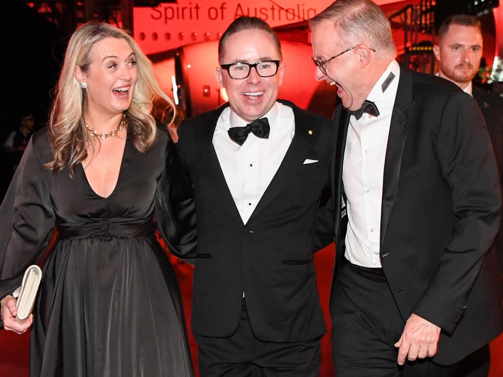 The PM’s fiancee Jodie Haydon, Alan Joyce and Anthony Albanese at the Qantas 100th Gala Dinner at hangar 96 at Sydney's International Airport on March 31, 2023. Picture: Getty Images