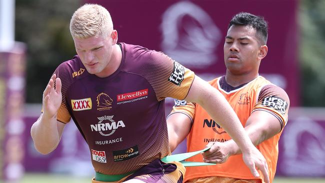 Thomas Flegler (left). The Brisbane Broncos training at Red Hill. Pic Peter Wallis