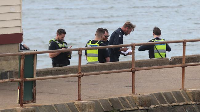 Police with diving gear on the beach. Diving accident with police on scene at St Leonards Pier. Picture: Alan Barber