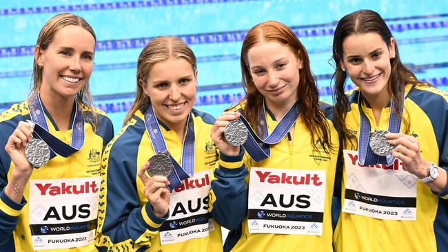 (L-R) Silver medallists Australia's Emma McKeon, Australia's Abbey Harkin, Australia's Mollie O'Callaghan and Australia's Kaylee McKeown pose during the medals ceremony for the women's 4x100m medley relay swimming event during the World Aquatics Championships in Fukuoka on July 30, 2023. (Photo by Yuichi YAMAZAKI / AFP)