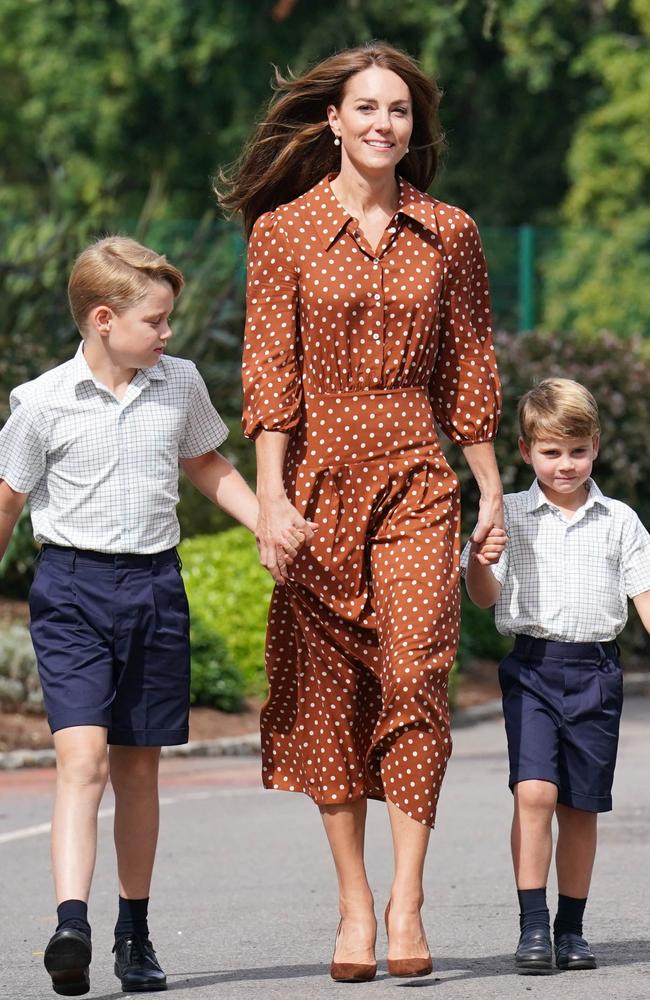 Meanwhile Kate held hands with her sons, George and Louis. Picture: Jonathan Brady/Getty Images