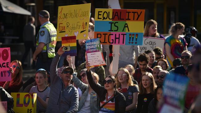 Protesters march through the Sydney CBD demanding recognition of same-sex marriage. Picture: AFP