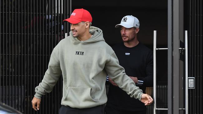 Cody Walker (left) has been cleared to return to training after he was forced to breach the NRL’s strict COVID-19 quarantine regulations to report the incident to police. Picture: AAP