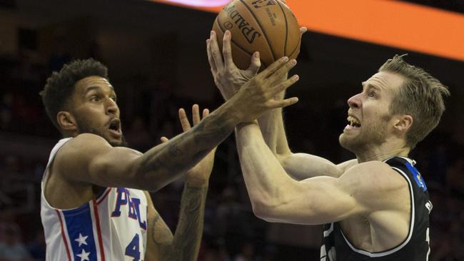 Jonah Bolden comes to grips with Melbourne’s David Barlow. Picture: AFP.