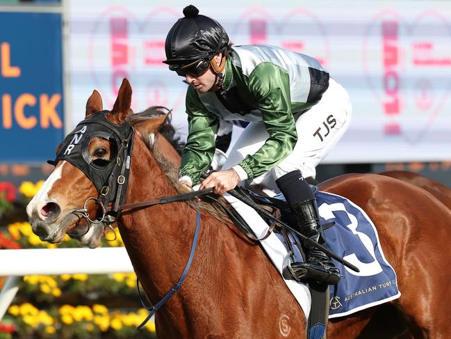 SYDNEY, AUSTRALIA - JULY 13: Tyler Schiller riding Defining wins Race 6 I Love 0% Cocktails during Sydney Racing at Royal Randwick Racecourse on July 13, 2024 in Sydney, Australia. (Photo by Jeremy Ng/Getty Images)