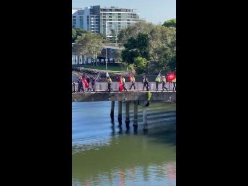 ‘Not going away’: Union members protest along Gold Coast Highway