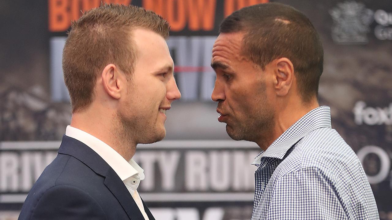 Jeff Horn and Anthony Mundine face off during their press conference. Photo: Peter Wallis
