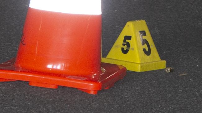 A bullet casing on the ground of the carpark after the shooting. Picture: Brett Hartwig