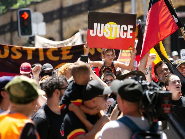 SYDNEY, AUSTRALIA - NewsWire Photos, JANUARY 26, 2022: Crowds gather in Sydney as Invasion Day protesters march from Belmore Park to Victoria Park . Picture: NCA NewsWire / Brendan Read