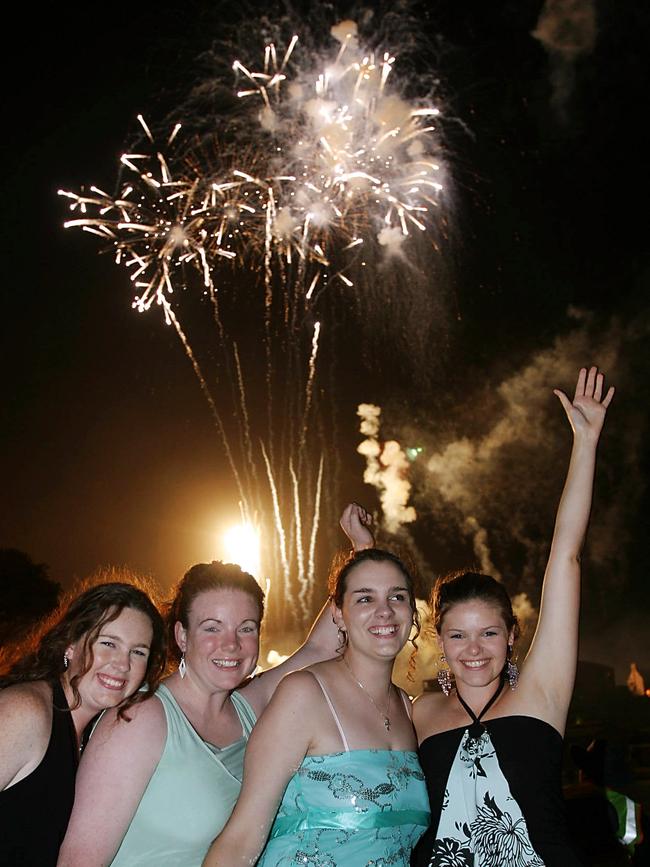 Friends (L-R) Rhiannon Lewis (18), Sara Barlow (18), Bethany Cameron (18) and Shelley Ellercamp (18) enjoy the fireworks display during the New Year's Eve celebrations on the Newcastle Foreshore.