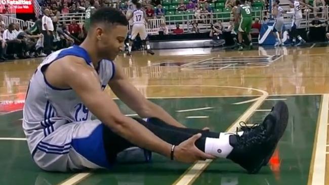 Ben Simmons goes down with cramps.