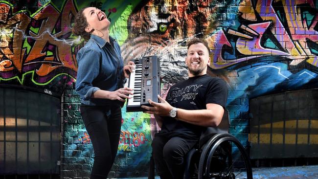 Dylan Alcott with musician Eliza Hull who will perform at his Ability Festival. Picture: Tony Gough