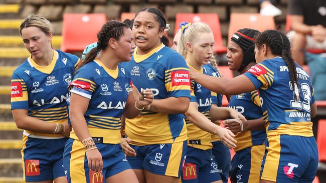 NEWCASTLE, AUSTRALIA - FEBRUARY 27: Tiana Penitani of the Eels celebrates scoring a try with teammates during the round one NRLW match between the Newcastle Knights and the Parramatta Eels at McDonald Jones Stadium, on February 27, 2022, in Newcastle, Australia. (Photo by Ashley Feder/Getty Images)