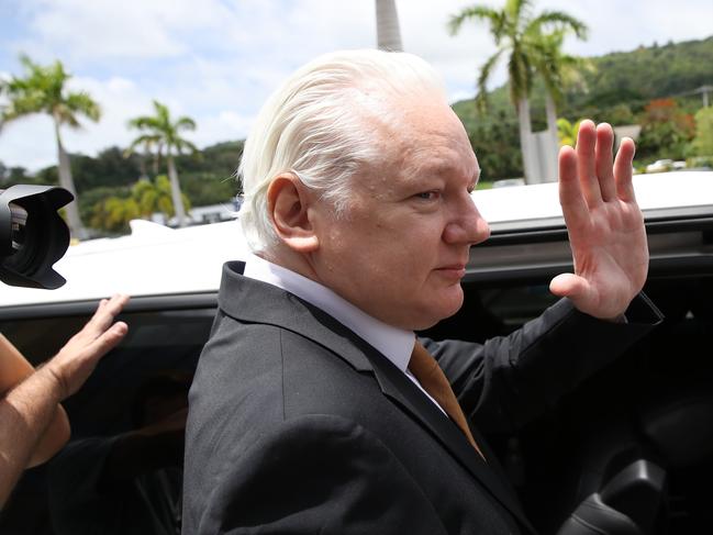 The WikiLeaks founder waved to waiting media as he left the court. Picture: Getty Images