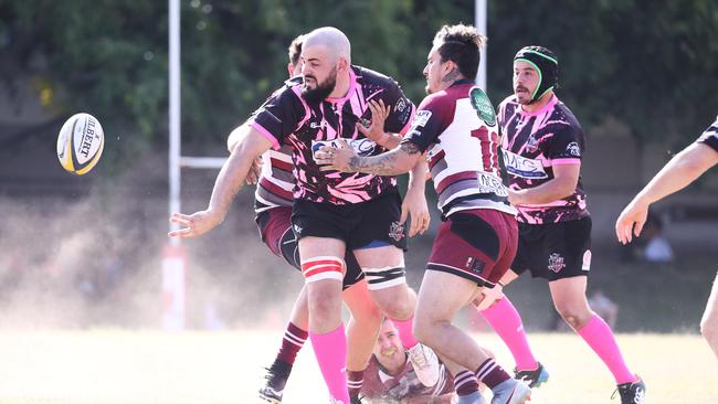 Griffith Uni Colleges Knights forward Kerrod Martorella runs at the Nerang Bulls defence during their GCDRU First Grade clash at Ashmore. Photograph : Jason O'Brien