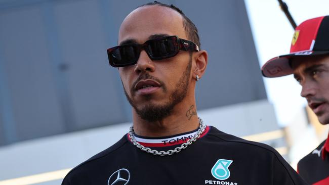 Mercedes' British driver Lewis Hamilton arrives for a press conference at the Jeddah Corniche Circuit on March 16, 2023, ahead of the 2023 Saudi Arabia Formula One Grand Prix. (Photo by Giuseppe CACACE / AFP)