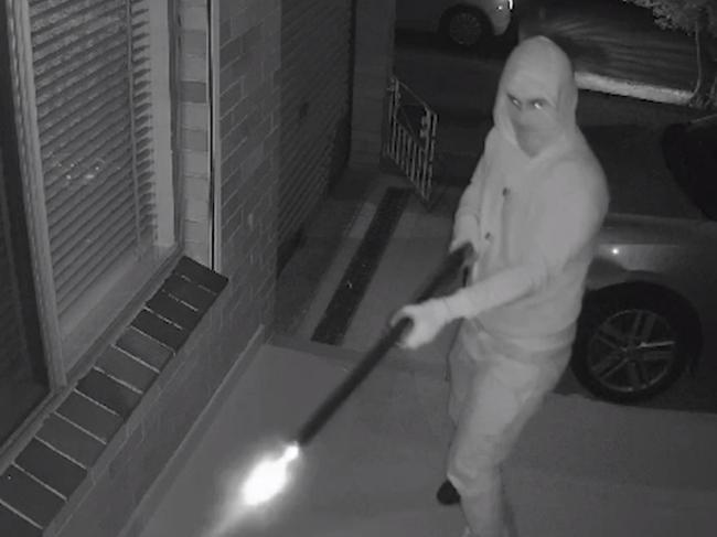 CCTV footage shows the moment a masked man opens fire into the family home of alleged Melbourne underworld figure Mohammed Charif Oueida. Source: 9News