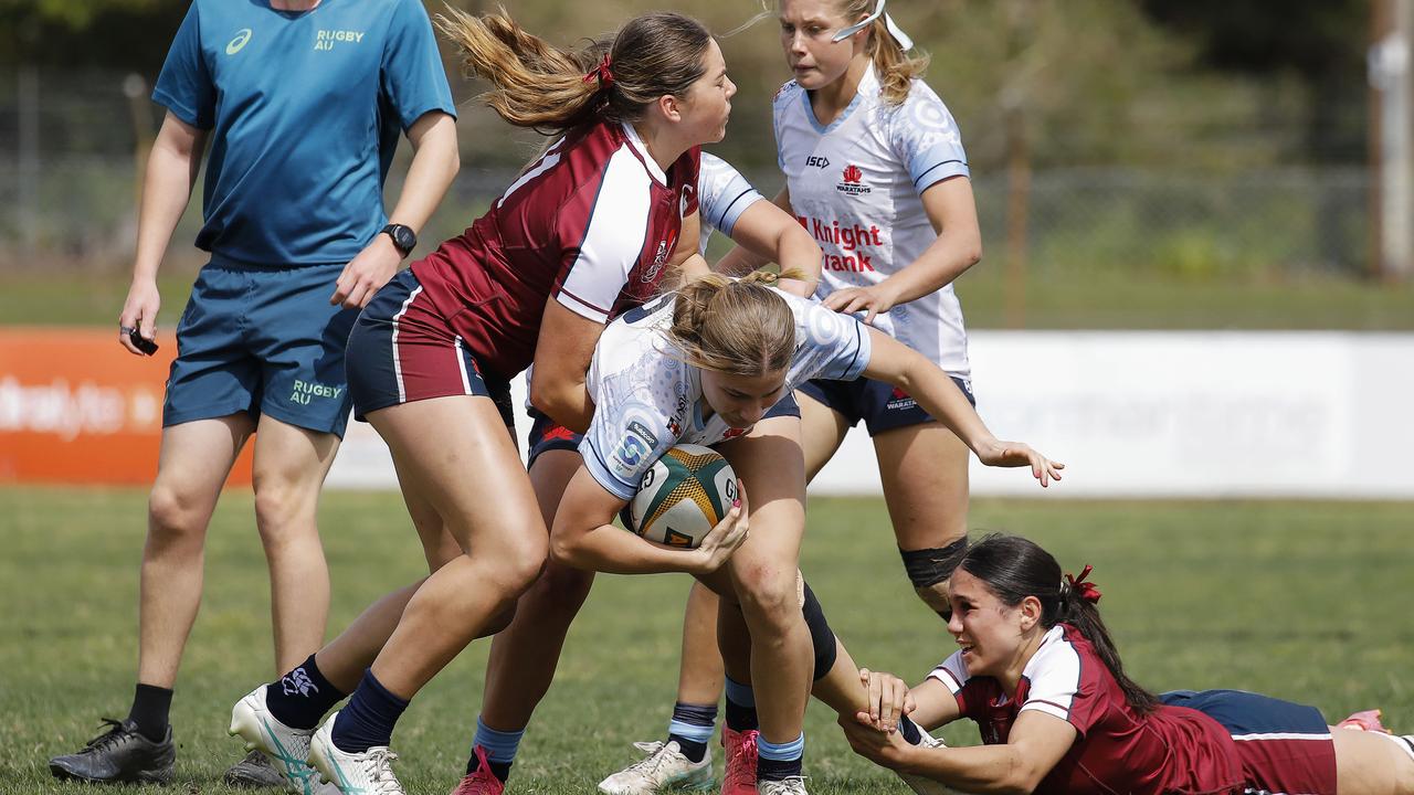 The Reds were all over NSW in defence in this match at the Next Gen 7s series in Sydney. Photos: Supplied/Karen Watson/Rugby Australia